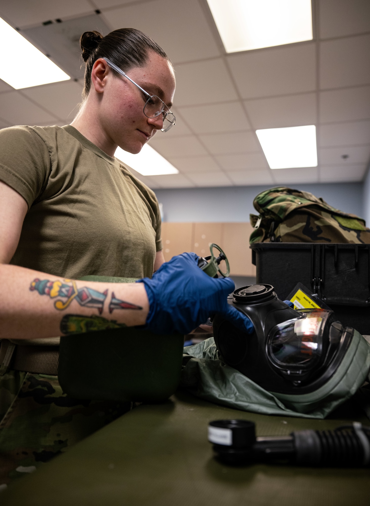 U.S. Air Force Senior Airman Isabella Radzik, 436th Operations Support Squadron Aircrew Flight Equipment journeyman, inspects an M69 aircrew mask drinking tube at Dover Air Force Base, Delaware, June 3, 2025. The AFE team provides inspections and maintenance for flight safety equipment such as aircrew oxygen masks, parachutes, emergency escape slides and life rafts for the C-5M Super Galaxy and C-17 Globemaster III. (U.S. Air Force photo by Staff Sgt. Marco A. Gomez)