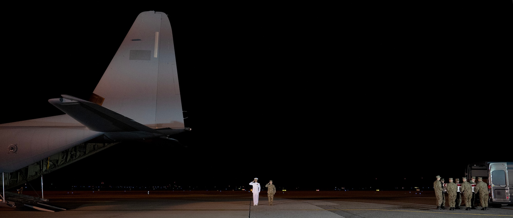 A U.S. Navy carry team transfers the remains of U.S. Navy Master-at-Arms Seaman Apprentice Aristan R. Johnson of Round Rock, Texas, June 3, 2025, at Dover Air Force Base, Delaware.  Johnson was assigned to Navy Security Forces Guantanamo Bay. (U.S. Air Force photo by Tech. Sgt. Rusty Frank)