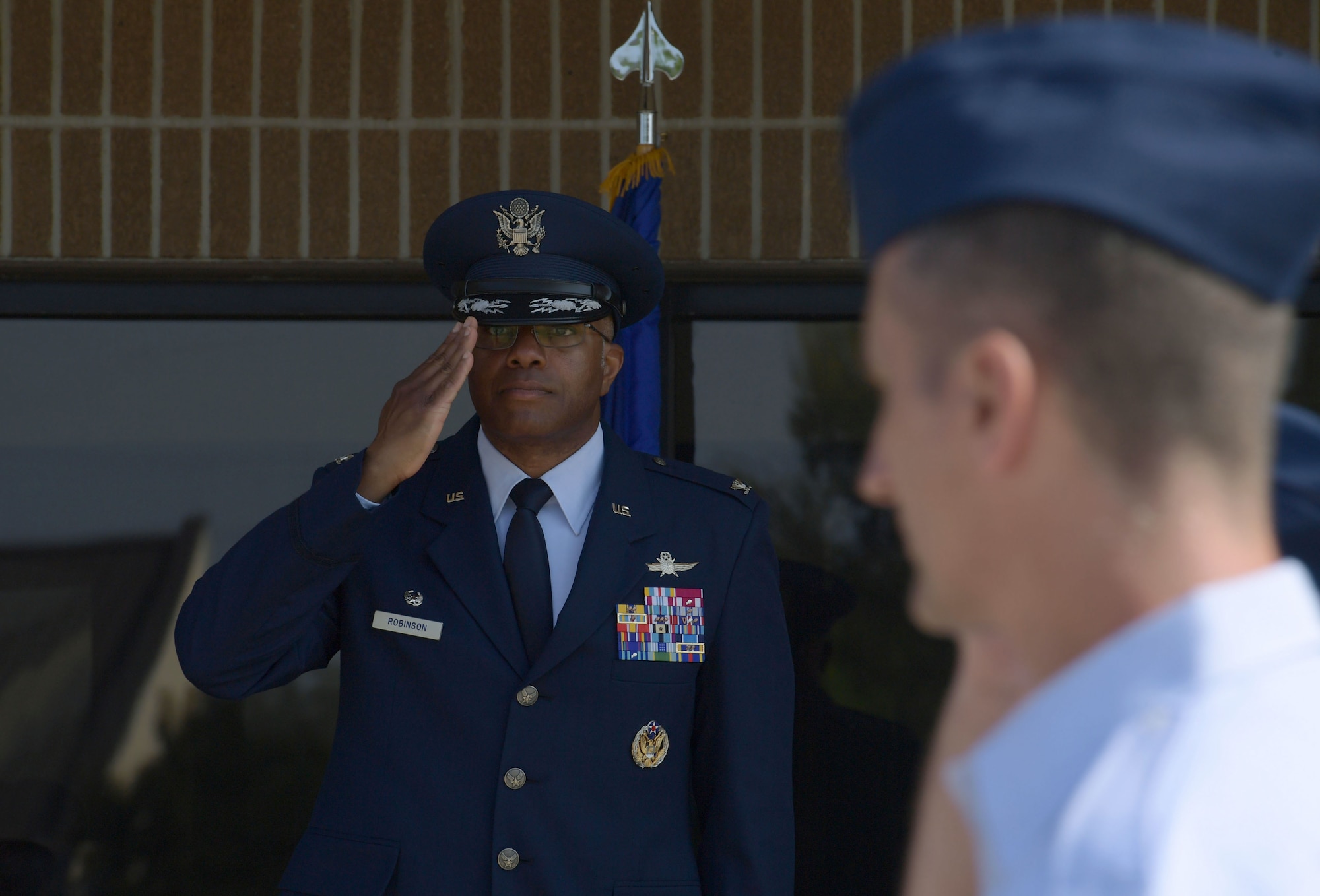 An airman saluting.