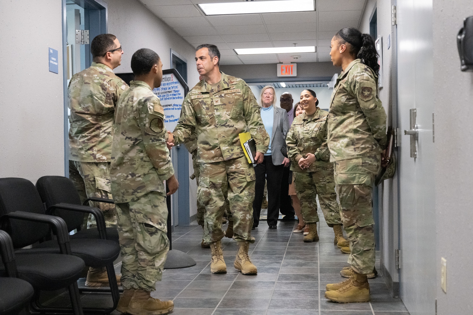 U.S. Air Force Col. Jamil Musa, center, 436th Airlift Wing commander, meets members of the 436th Force Support Squadron during a command team immersion tour at Dover Air Force Base, Delaware, June 3, 2025. The new command team toured various units within the 436th Mission Support Group to familiarize themselves with their mission and capabilities. (U.S. Air Force photo by Mauricio Campino)