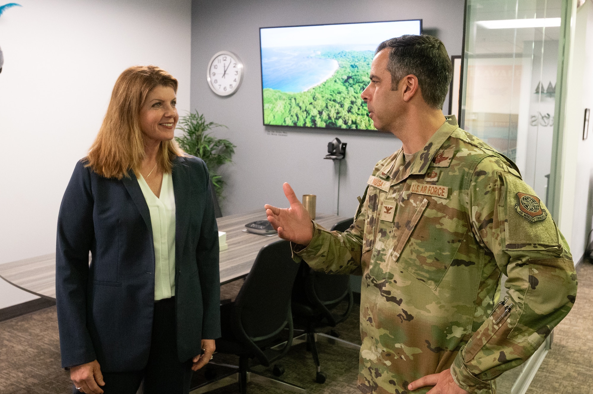 U.S. Air Force Col. Jamil Musa, right, 436th Airlift Wing commander, speaks with Renee Russo, 436th Contracting Squadron Deputy Director of Business Operations, during a command team immersion tour at Dover Air Force Base, Delaware, June 3, 2025. The new command team toured various units within the 436th Mission Support Group to familiarize themselves with their mission and capabilities. (U.S. Air Force photo by Mauricio Campino)