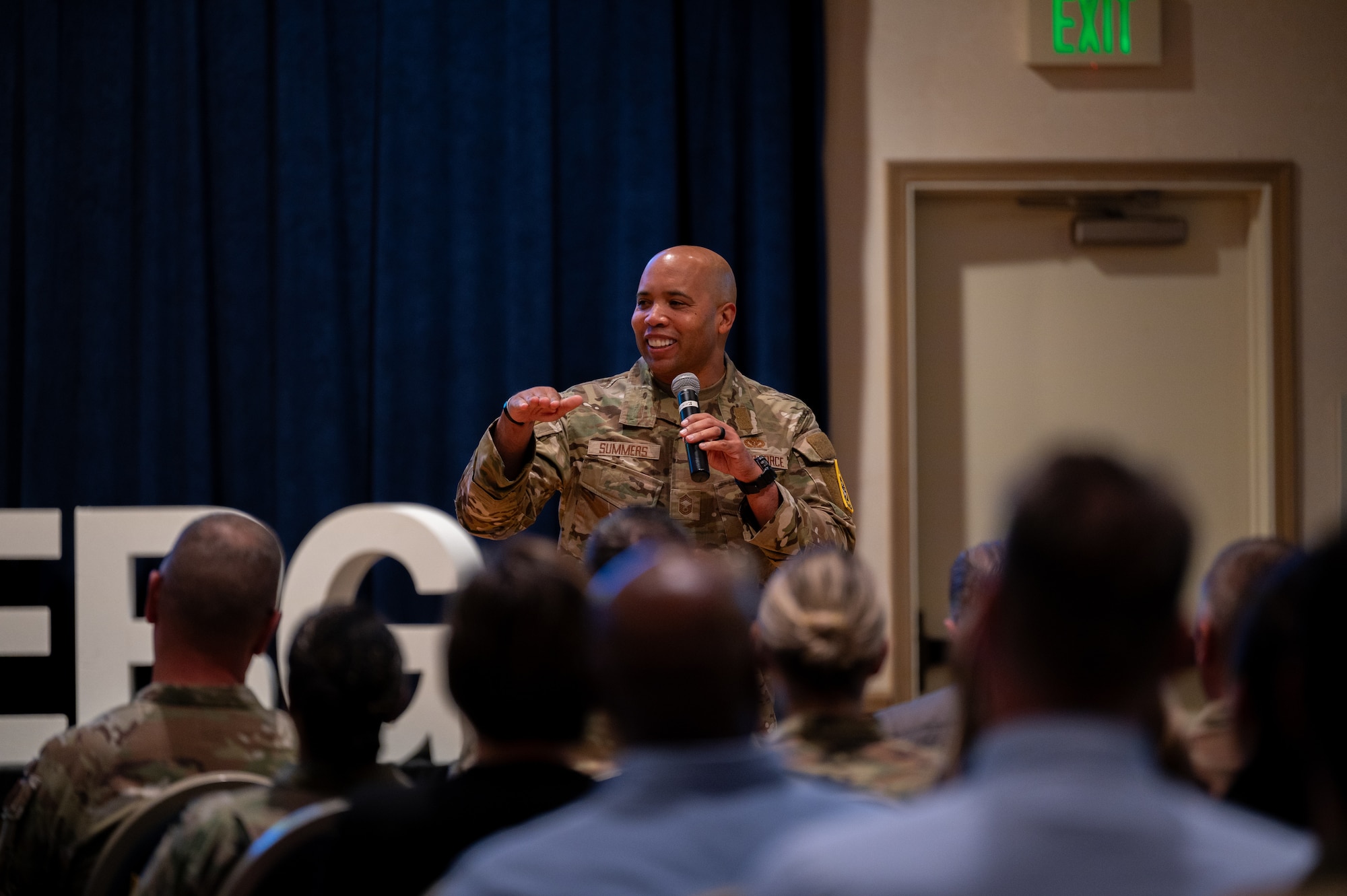 U.S. Air Force Chief Master Sgt. Malcolm Summers, Space Launch Delta 30 senior enlisted airman, smiles with attendees of a commander’s call at Vandenberg Space Force Base, Calif., June 3, 2025. Summers spoke on a new interactive initiative on base titled, “Airman Space”, that gives opportunities for Airmen assigned to SLD 30 to connect to the Space Force mission while remaining true to their Air Force roots.