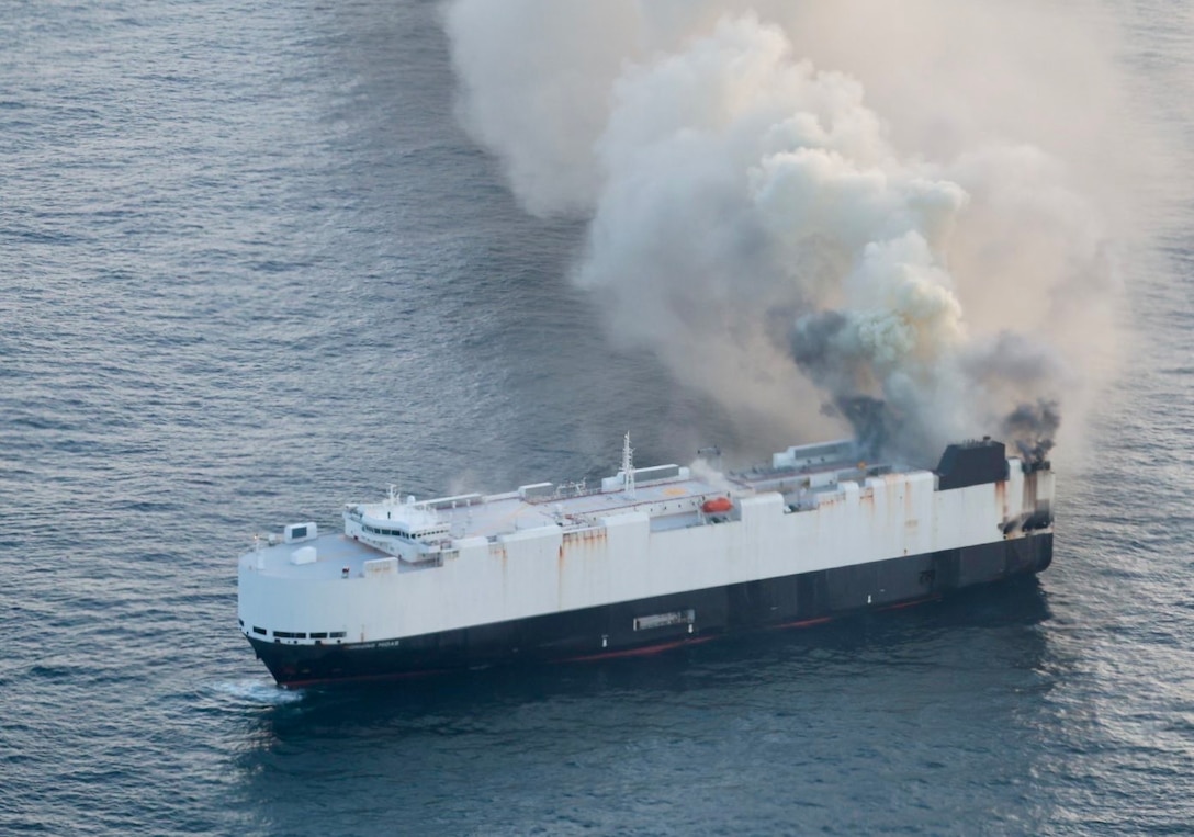 A Coast Guard C-130J Super Hercules aircrew from Air Station Kodiak conducts an overflight of a fire aboard the cargo vessel Morning Midas approximately 300 miles south of Adak, Alaska, June 3, 2025.