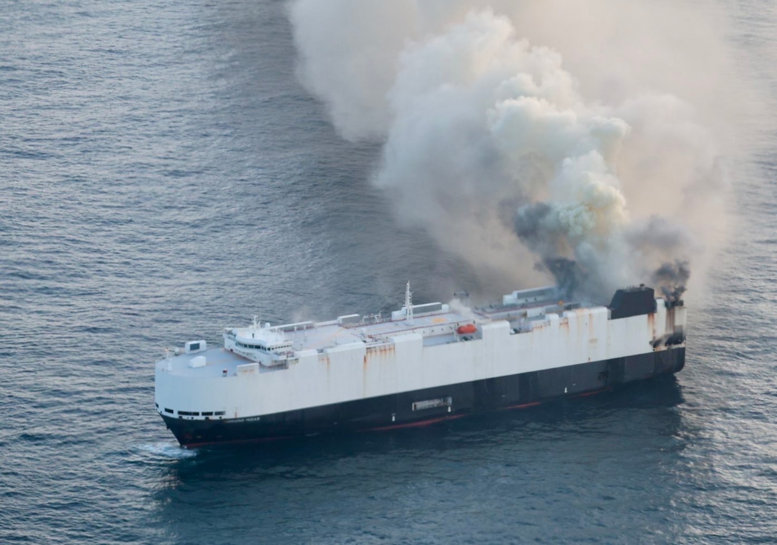 A Coast Guard C-130J Super Hercules aircrew from Air Station Kodiak conducts an overflight of a fire aboard the cargo vessel Morning Midas approximately 300 miles south of Adak, Alaska, June 3, 2025.