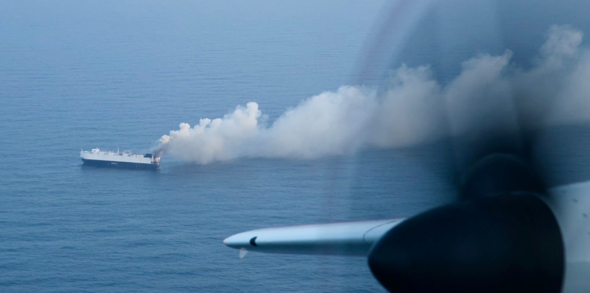 A Coast Guard C-130J Super Hercules aircrew from Air Station Kodiak conducts an overflight of a fire aboard the cargo vessel Morning Midas approximately 300 miles south of Adak, Alaska, June 3, 2025.
