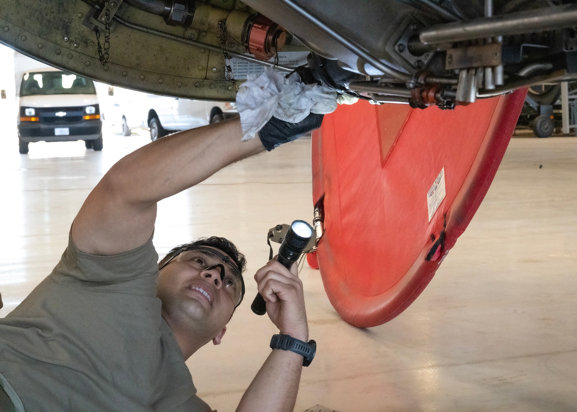 U.S. Air Force Airman First Class Leonardo Menchaca, 940th Air Refueling Wing Maintenance Squadron, conducts a 900 hour inspection on a U.S. Air Force KC-135 Stratotanker, June 3, 2025.