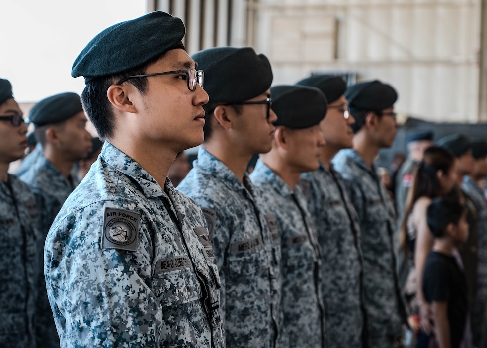 Republic of Singapore Air Force military members attend the 425th Fighter Squadron Change of Command Ceremony