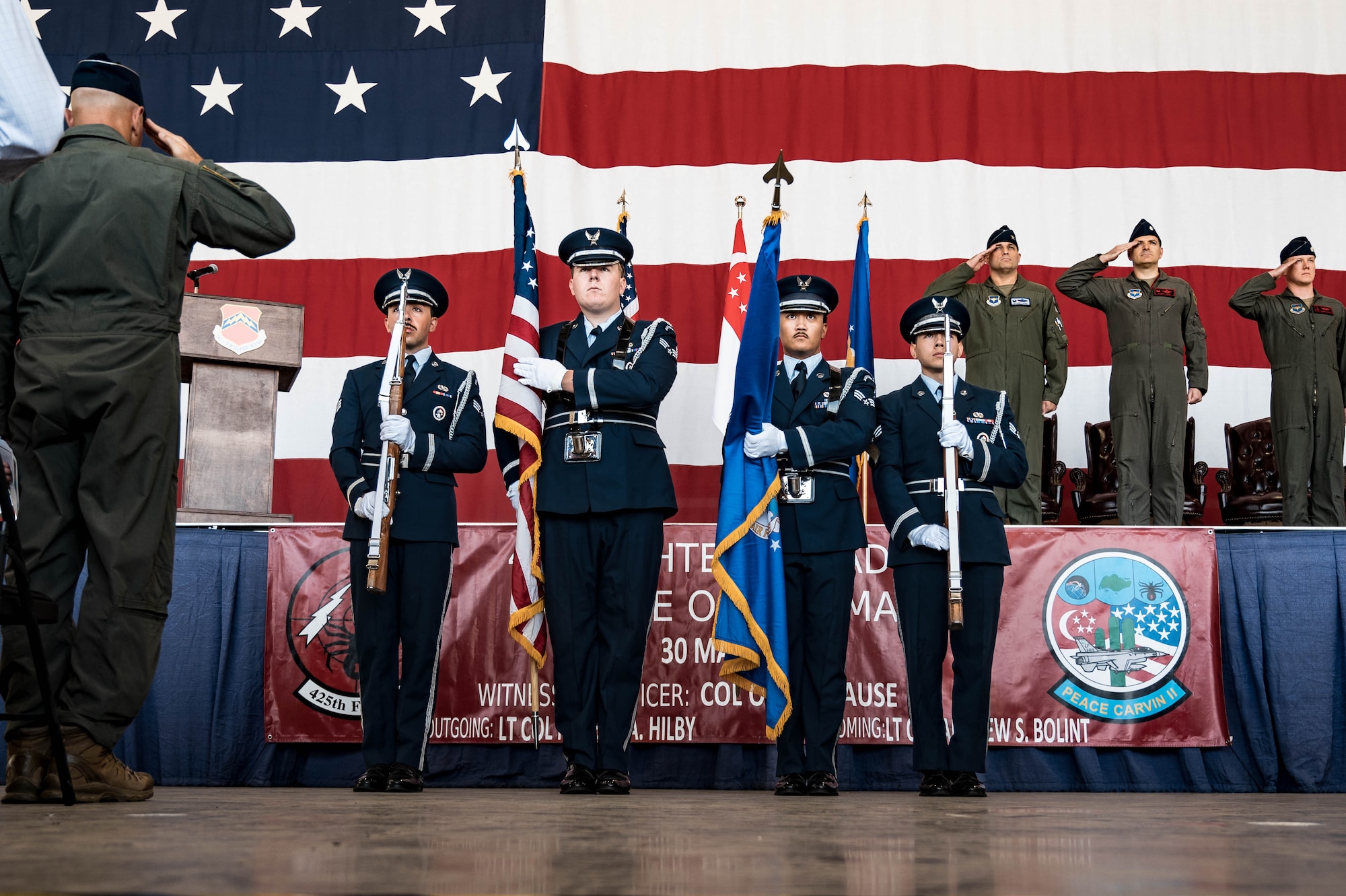 U.S. Air Force Honor Guard members assigned to the 56th Fighter Wing present the colors during the 425th Fighter Squadron Change of Command Ceremony