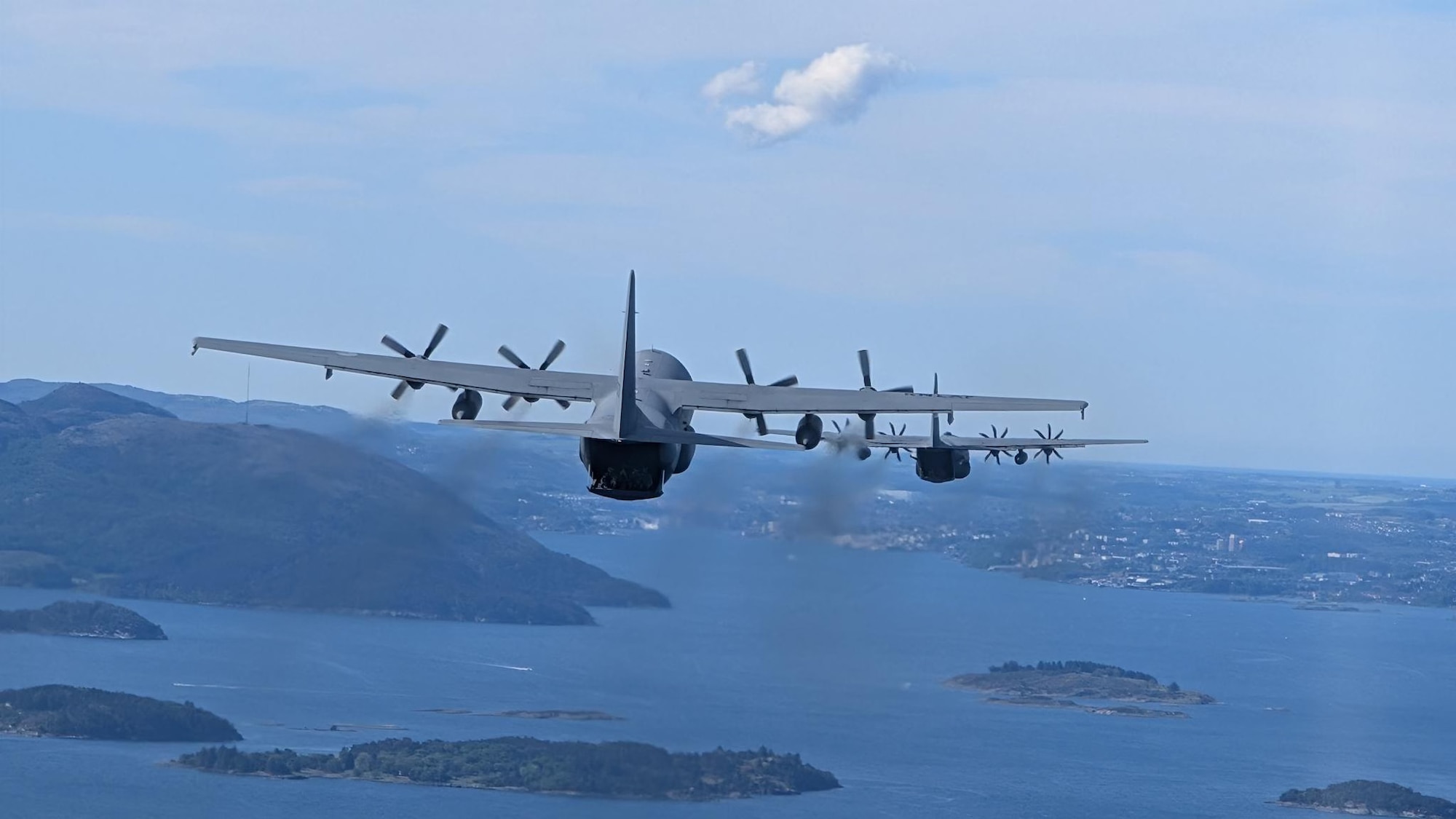 Military aircraft flying in formation
