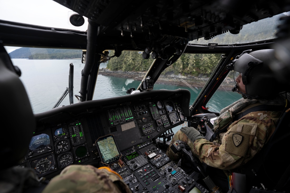 Alaska Army National Guard Chief Warrant Officer 2 David Berg, a UH-60L Black Hawk helicopter pilot, assigned to A Company, 1-168th General Support Aviation Battalion, conducts flight operations over Southeast Alaska near Juneau, Jan. 24, 2025.