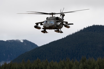 An Alaska Army National Guard UH-60L Black Hawk helicopter assigned to A Company, 1-168th General Support Aviation Battalion conducts flight operations over Southeast Alaska near Juneau, Jan. 24, 2025.