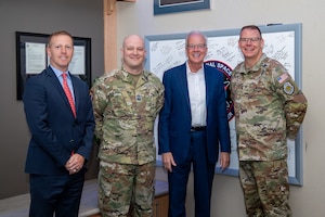 Senator Jerry Moran, third from left, poses with U.S. Space Force Col. Stephen Lyon, National Space Defense Center director and Space Delta 15 commander, fourth from left, at the NSDC, Schriever Space Force Base, Colo., May 30, 2025. Moran, a member of the Senate Select Committee on Intelligence (SSCI) and co-chair of the Space Force Caucus, visited the NSDC to receive briefings on space threats and capabilities and a command-and-control and intelligence tools demonstration. (U.S. Space Force photo by Tiana Williams)
