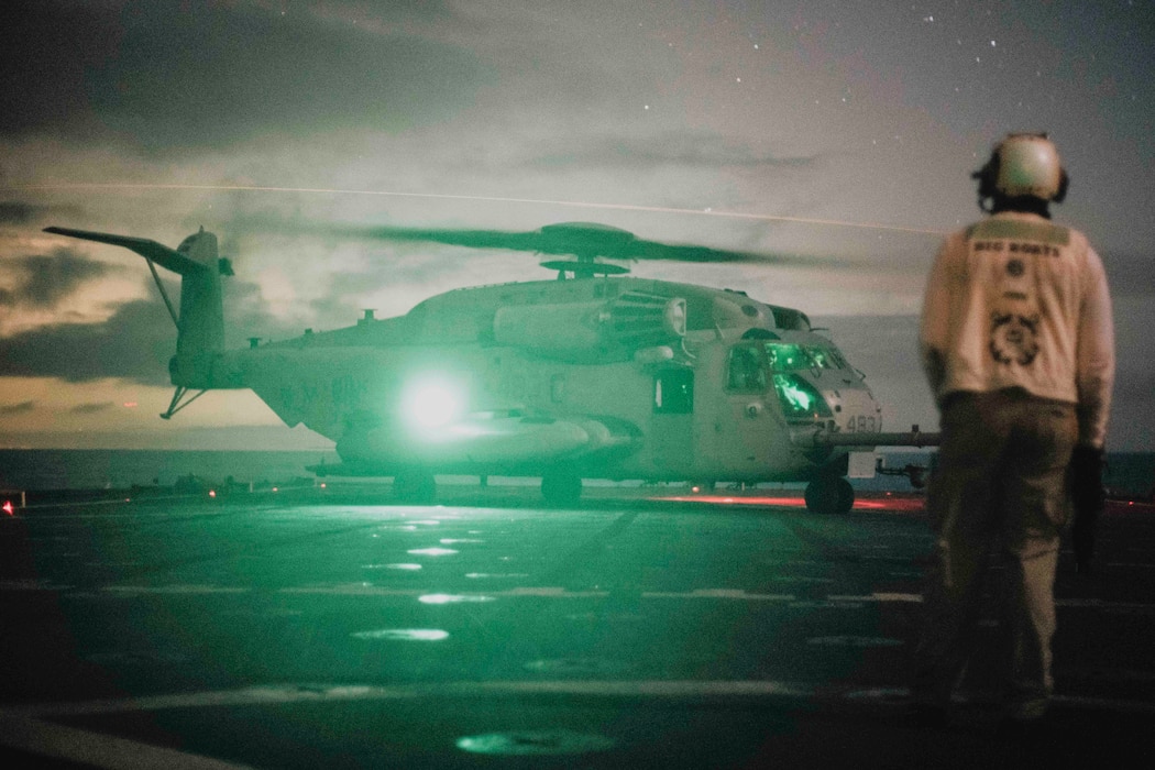 A U.S. Marine Corps CH-53E Super Stallion attached to Marine Heavy Helicopter Squadron 466, Marine Aircraft Group 16, 3rd Marine Aircraft Wing, prepares to lift off the flight deck of the of the amphibious dock landing ship USS Harpers Ferry (LSD 49) during Quarterly Underway Amphibious Readiness Training 25.3 while underway in the Pacific Ocean, June 1, 2025.