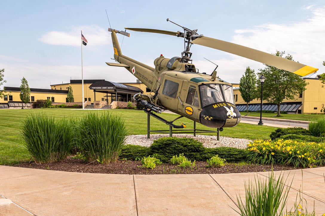 Photo of an Apache helicopter outside of the Admin Bldg