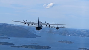Military aircraft flying in formation