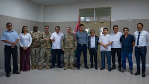 U.S. Air Force AMISTAD team members and Hospital Regional de Loreto leadership pose for a photo on the opening day of AMISTAD 2025 in Iquitos, Peru, June 2, 2025. This Peruvian and U.S. medical assistance training opportunity offers real-world benefits to U.S. and partner nation medical teams and the people of Peru by relieving strained medical systems, training U.S. and local medical professionals, and promoting the health and well-being of the people of Peru. (U.S. Air Force photo by Senior Airman Victoria Edwards)