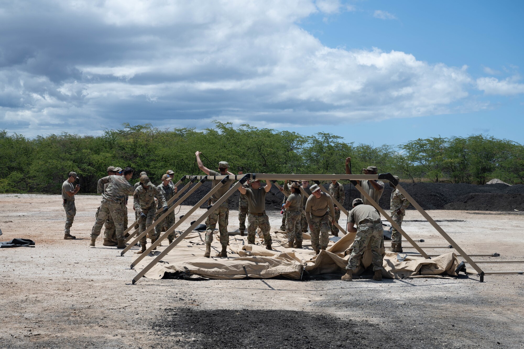 U.S. Air Force civil engineer Airmen put together a make shift shelter.