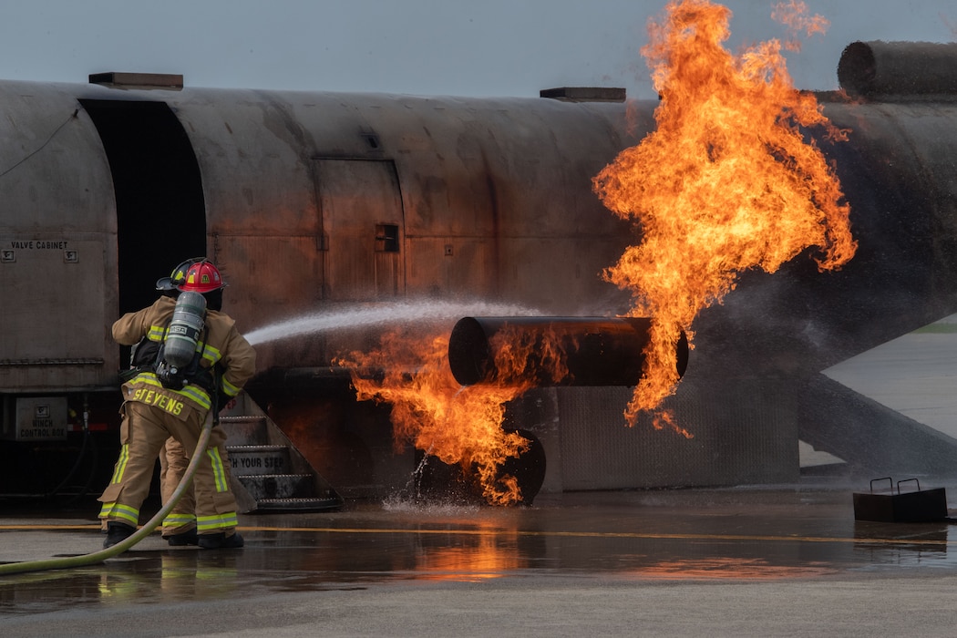 The 101st Fire and Emergency Services hosts members of the Vermont Air National Guard Fire Department from the 158th Fighter Wing for live fire training.