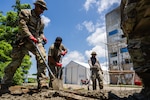VIRAC, Philippines (June 2, 2025) – Hawaii National Guardsmen and personnel from the Armed Forces of the Philippines construct a platform used to conduct urban rescue training with local emergency responders and civilian authorities in Virac, Philippines, June 2, 2025. This effort is part of a two-week urban rescue training exercise supporting the humanitarian assistance and disaster response objectives of Pacific Partnership 2025. Now in its 21st iteration, Pacific Partnership series is the largest annual multinational humanitarian assistance and disaster management preparedness mission conducted in the Indo-Pacific. Pacific Partnership works collaboratively with host and partner nations to enhance regional interoperability and disaster response capabilities, increase security and stability in the region, and foster new and enduring friendships in the Indo-Pacific. (U.S. Navy photo by Mass Communication Specialist 2nd Class Jordan Jennings)