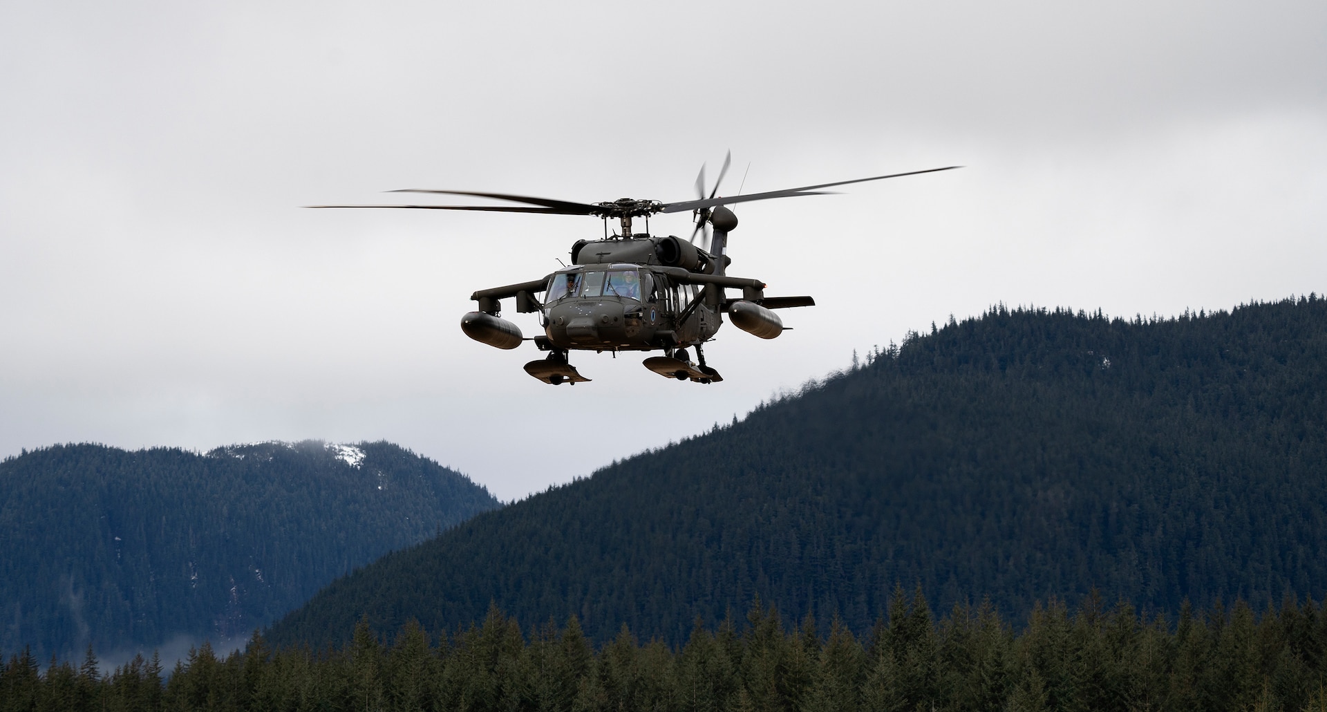 An Alaska Army National Guard UH-60L Black Hawk helicopter assigned to A Company, 1-168th General Support Aviation Battalion conducts flight operations over Southeast Alaska near Juneau, Jan. 24, 2025.