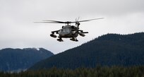 An Alaska Army National Guard UH-60L Black Hawk helicopter assigned to A Company, 1-168th General Support Aviation Battalion conducts flight operations over Southeast Alaska near Juneau, Jan. 24, 2025.