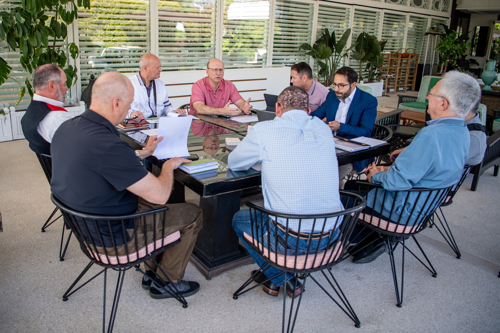 (Center) Dr. David D’Andrea, hosts a meeting between Oklahoma National Guard leaders, a representative of the Chickasaw Nation, and an Italian architecture firm, to discuss the design of a proposed 45th Infantry Division Monument in Paestum, Italy, on May 6, 2025. The monument is one of many planned to be dedicated as part of the Thunderbird Trail, a memorial trail commemorating the 45th Infantry Division’s World War II service. (Oklahoma National Guard photo by Staff Sgt. Anthony Jones)