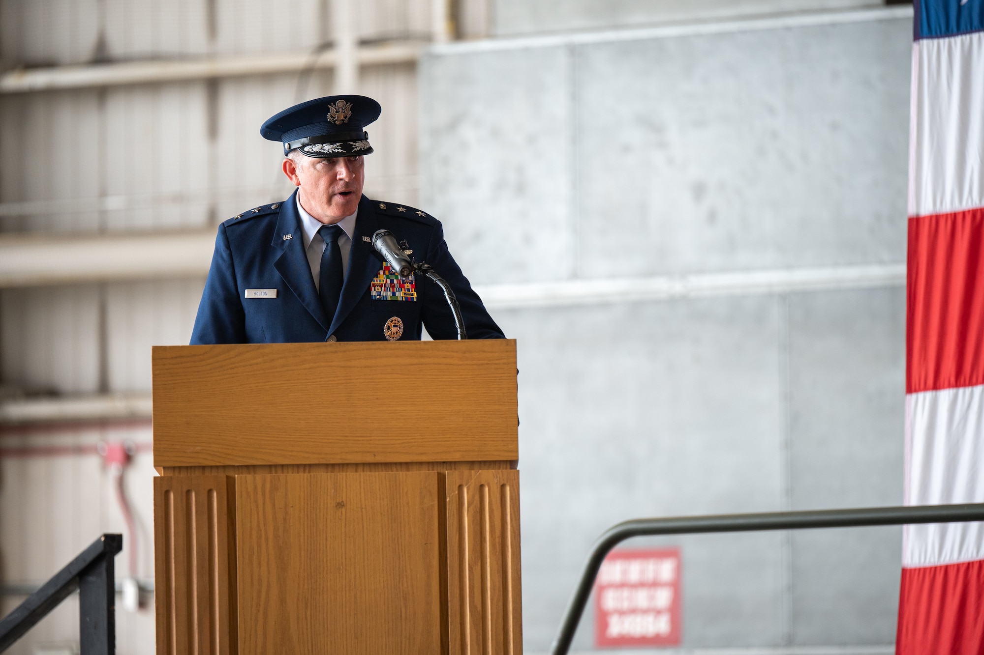 U.S. Air Force Maj. Gen. Charles Bolton, Eighteenth Air Force commander, thanked Col. William ‘Chris’ McDonald, 436th Airlift Wing outgoing commander, for his service and leadership of the Eagle Wing, during the 436th AW change of command ceremony on Dover Air Force Base, Delaware, May 30, 2025. Bolton presided over the ceremony in which Col. Jamil Musa assumed command of the Eagle Wing. (U.S. Air Force photo by Senior Airman Trenten Walters)