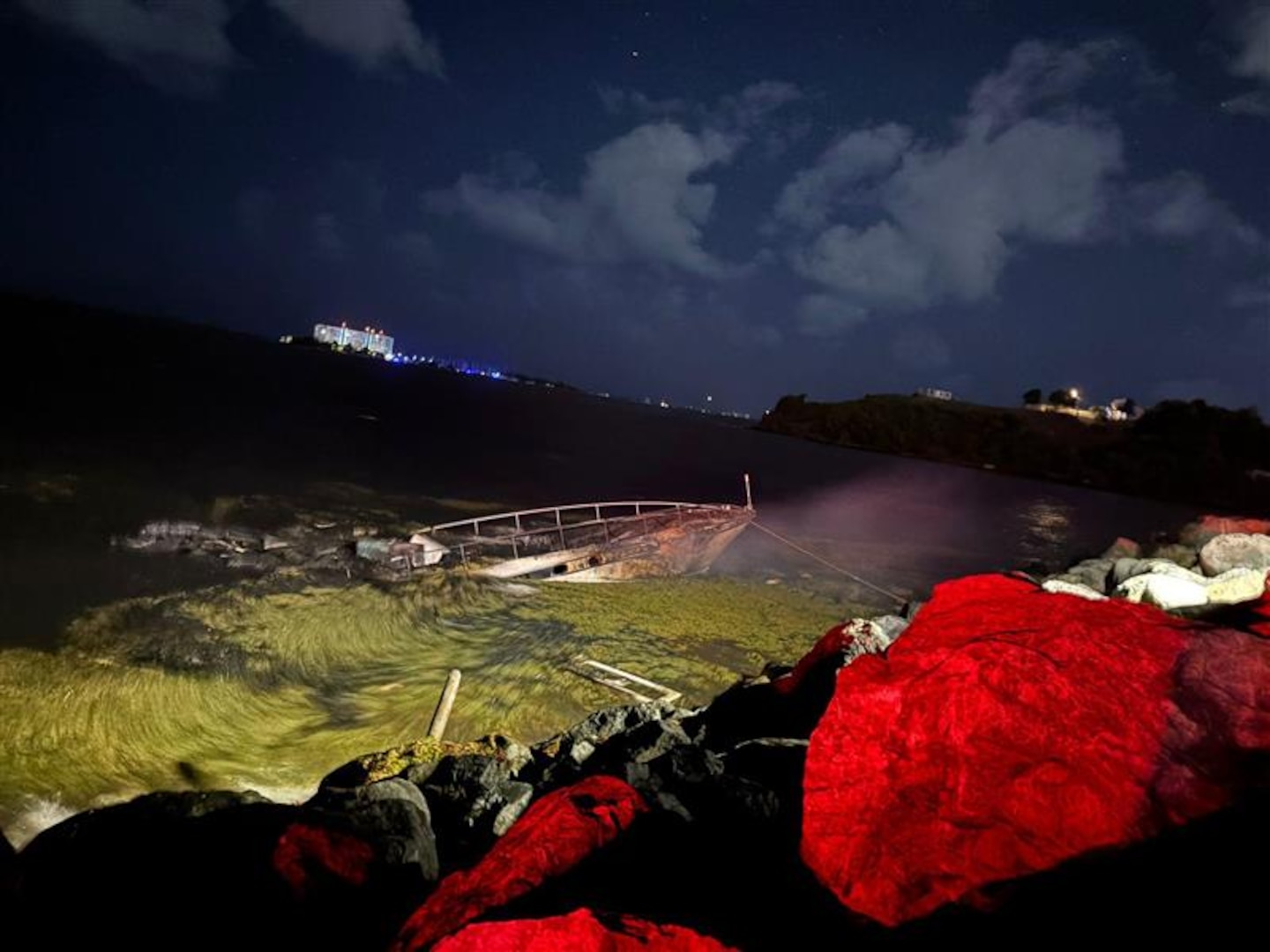 Vessel Emilia, a 75-foot motor yacht, mostly sunk with its bow sticking out of the water, following a vessel fire with five people onboard in Fajardo, Puerto Rico, June 4, 2025. All people onboard safely evacuated the vessel and were rescued by a Good Samaritan. Coast Guard Sector San Juan marine investigators and incident management personnel are responding and investigating this incident. (Courtesy Photo)