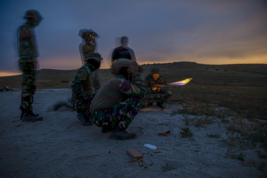 Members of the Indonesian Korps Marinir fire a Mk22 Mod 0 advanced sniper rifle during live-fire training as part of an annual bilateral reconnaissance exchange with U.S. Marines with 1st Reconnaissance Battalion, 1st Marine Division, at Marine Corps Base Camp Pendleton, California, May 28, 2025. This exchange strengthens relationships and enhances the capabilities and interoperability between the U.S. and Indonesian reconnaissance forces. (U.S. Marine Corps photo by Lance Cpl. Andrew Whistler)