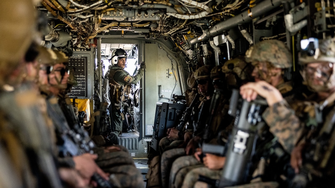 U.S. Marines with 2nd Battalion, 1st Marine Regiment, and Marine Medium Tiltrotor Squadron (VMM) 363, both assigned to Marine Rotational Force – Darwin 25.3 fly in an MV-22B Osprey during Exercise Southern Jackaroo at Townsville Field Training Area, Queensland, Australia, May 28, 2025. Southern Jackaroo is an annual exercise held between the U.S. Marine Corps, Australian Defence Force, and Japanese Ground Self Defense Force designed to enhance interoperability and combined readiness with Allies and partners. MRF-D is an annual six-month rotational deployment to enhance interoperability with the Australian Defence Force and allies and partners and provide a forward postured crisis response force in the Indo-Pacific. (U.S. Marine Corps photo by Cpl. Angelina Sara)