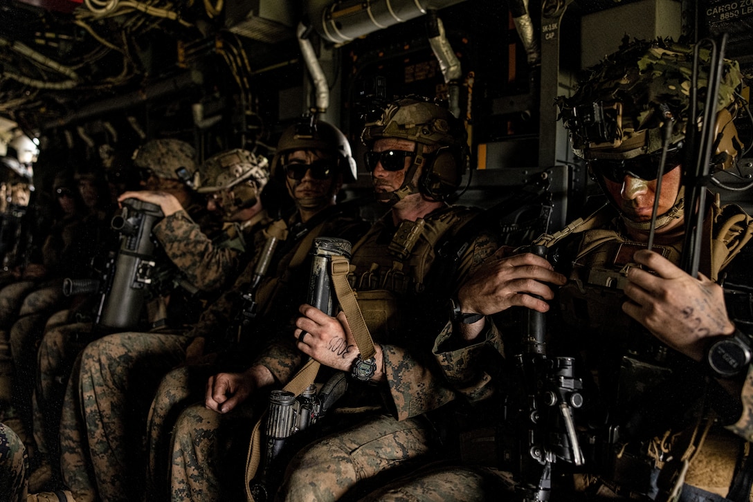 U.S. Marines with Weapons Company, 2nd Battalion, 1st Marine Regiment, Marine Rotational Force – Darwin 25.3, prepare for flight in an MV-22B Osprey assigned to Marine Medium Tiltrotor Squadron (VMM) 363, MRF-D during Exercise Southern Jackaroo at Townsville Field Training Area, Queensland, Australia, May 28, 2025. Southern Jackaroo is an annual exercise held between the U.S. Marine Corps, Australian Defence Force, and Japanese Ground Self Defense Force designed to enhance interoperability and combined readiness with Allies and partners. MRF-D is an annual six-month rotational deployment to enhance interoperability with the Australian Defence Force and allies and partners and provide a forward postured crisis response force in the Indo-Pacific. (U.S. Marine Corps photo by Cpl. Angelina Sara)