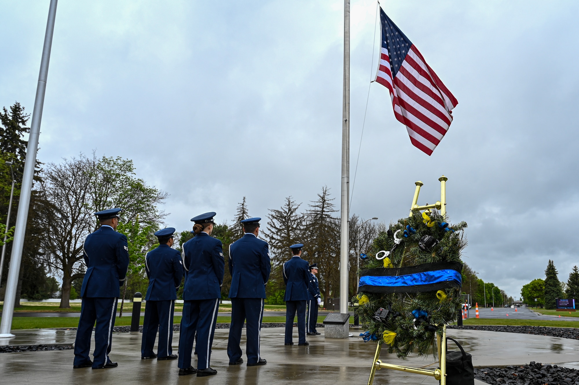 Airmen stand in uniform