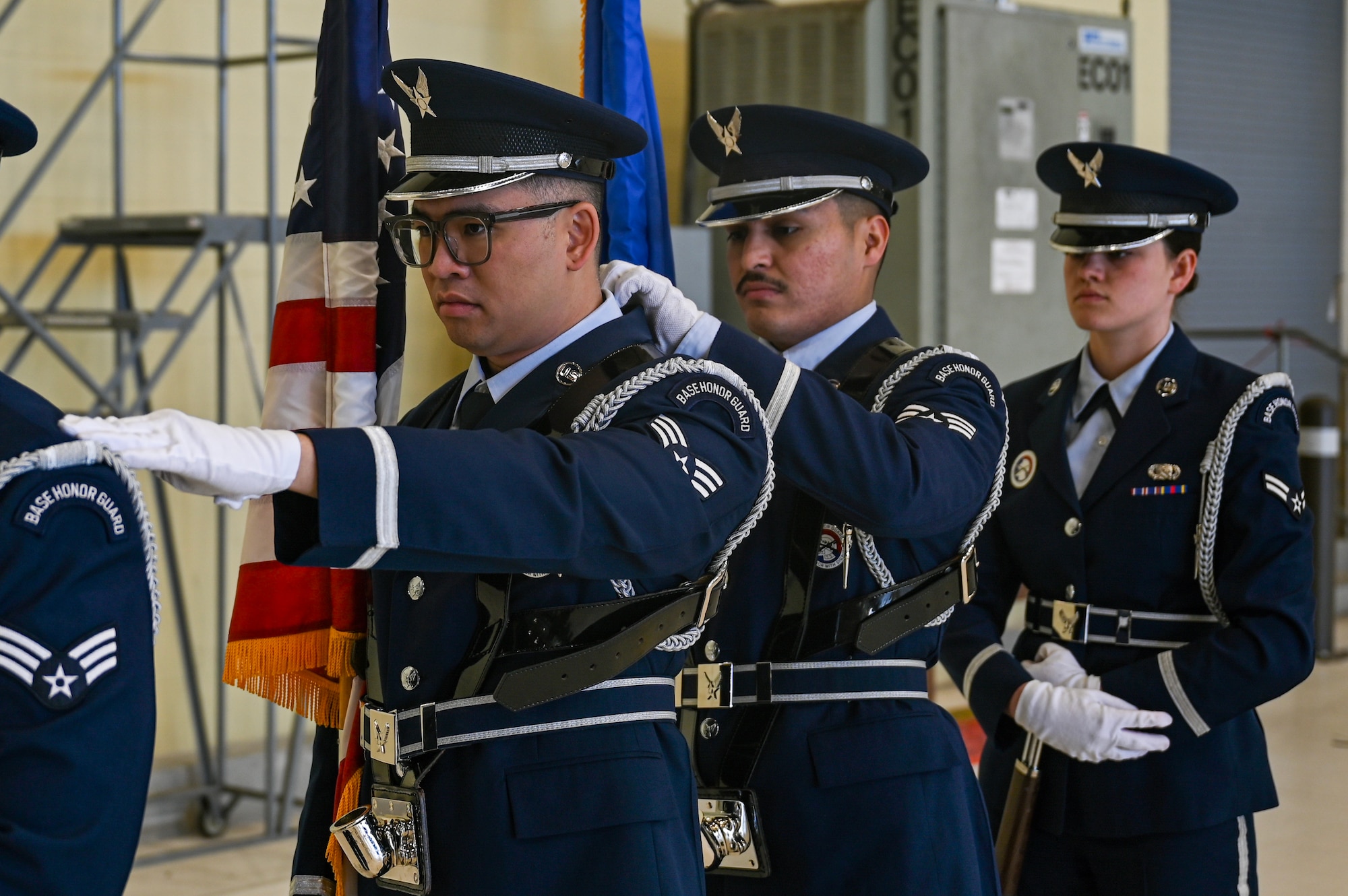 Airmen stand in uniform