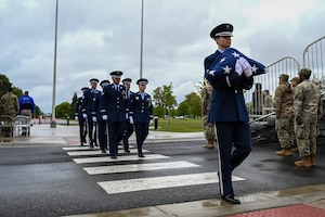 Airman carries flag