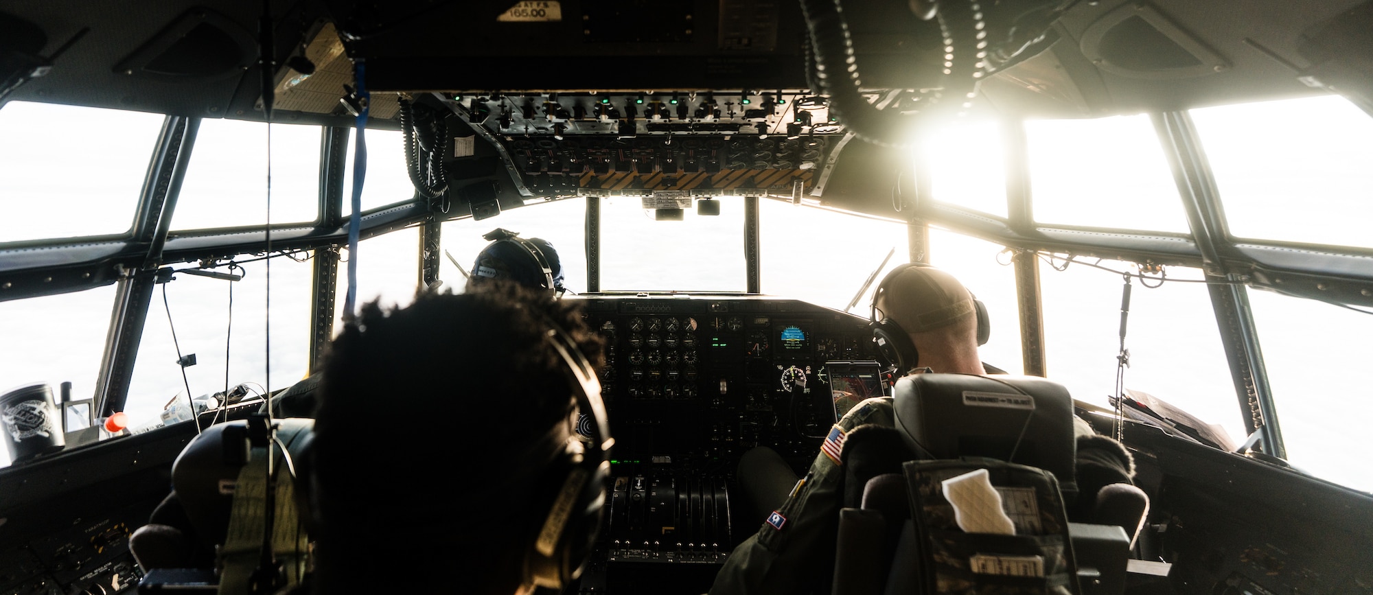 Members of the 187th Airlift Squadron, 153rd Airlift Wing, Wyoming Air National Guard, pilot a C-130 Hercules Aircraft.