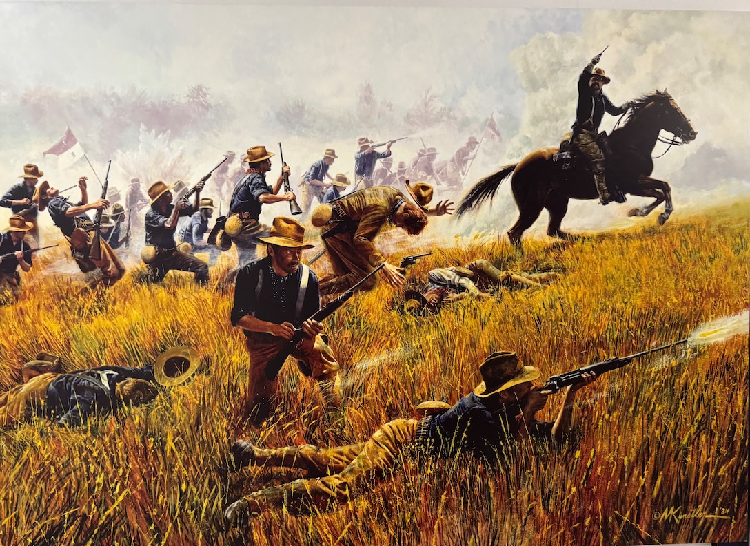 A battle painting of American soldiers in blue uniforms carrying muskets, swords and flags on the right rushing into a field of grass.