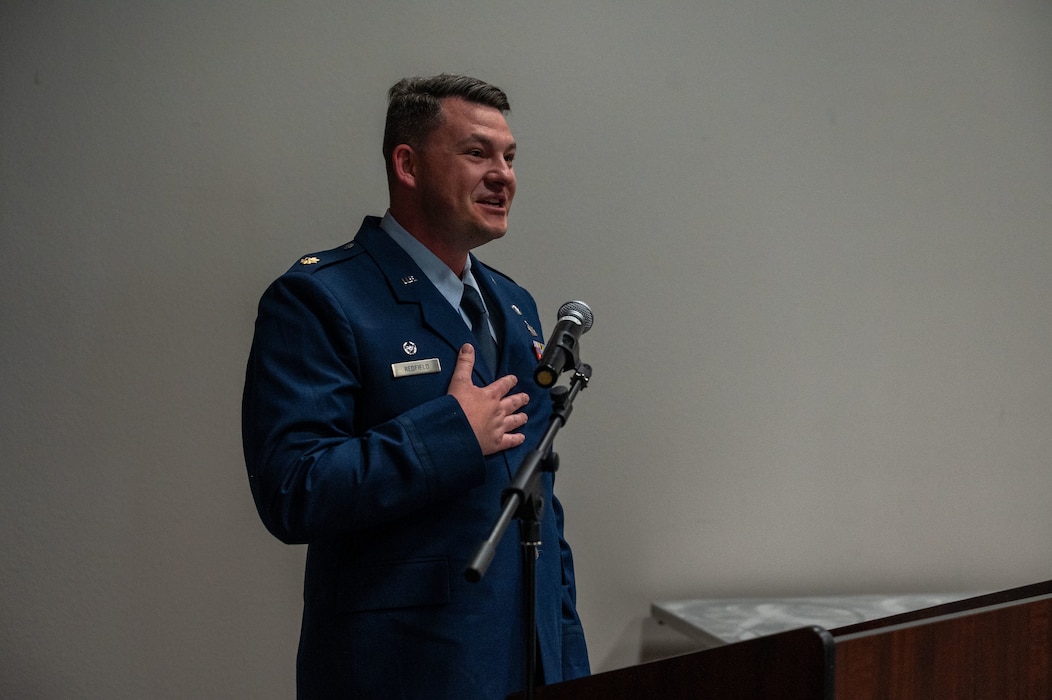 U.S. Air Force Maj. Thomas A. Redfield, incoming 17th Contracting Squadron commander, speaks at the 17th CONS Assumption of Command ceremony at the Powell Event Center, Goodfellow Air Force Base, Texas, June 4, 2025. The 17th CONS vision is to produce world-class business solutions to build upon a quality working, living, and lifelong learning environment. (U.S. Air Force photo by Airman 1st Class James Salellas)