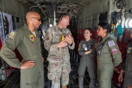 U.S. Air Force airmen assigned with the 129th Rescue Wing, California Air National Guard, and Philippine Air Force airmen conduct a static tour of the HC-130J during Exercise Balikatan '25, Cebu City, Philippines, Apr. 29, 2025.
