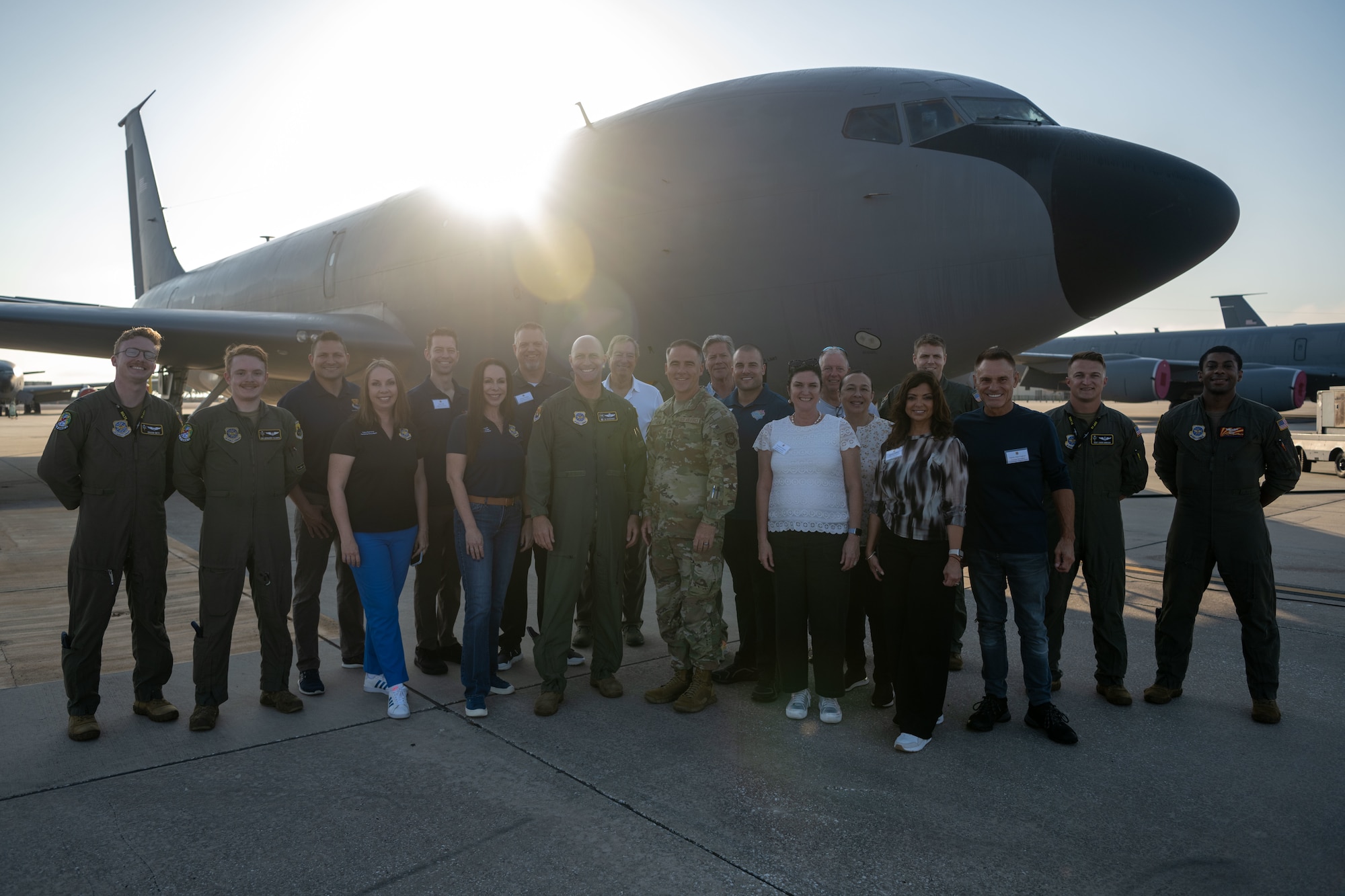 Leadership and aircrew members assigned to the 6th Air Refueling Wing pose for a photo alongside civic leaders from the Tampa Bay metropolitan area at MacDill Air Force Base, Florida, May 21, 2025. The two-day-long tour brought 15 civic leaders to Hurlburt Field, Florida, and Joint Base Charleston, South Carolina, to better understand the role of inter-wing interoperability in accomplishing Department of Defense initiatives. (U.S. Air Force photo by Senior Airman Zachary Foster)