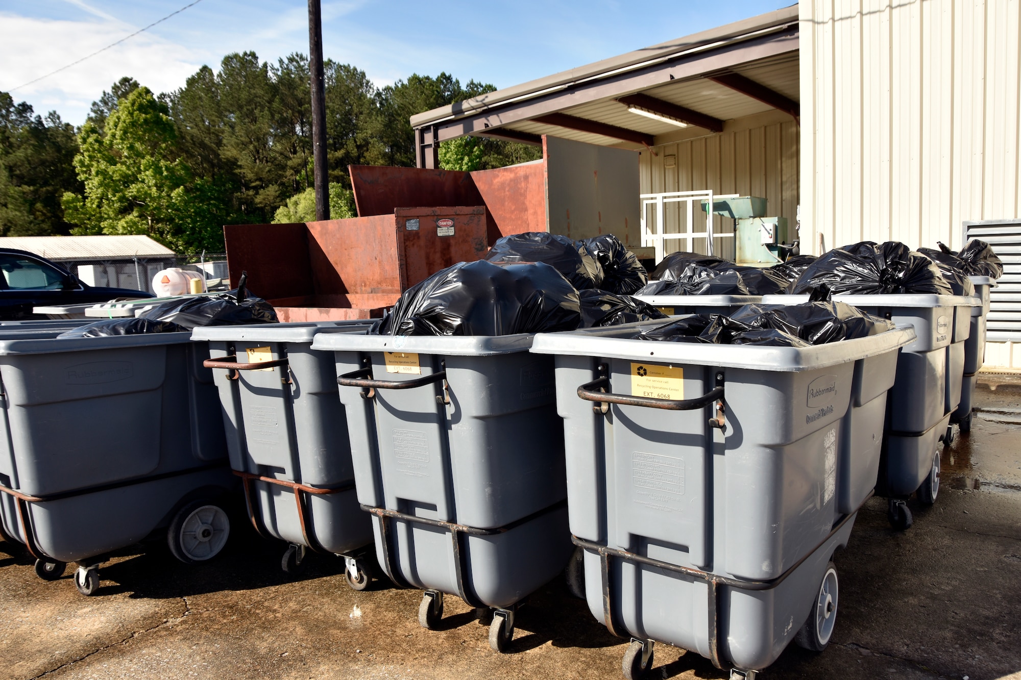 Bagged plastic bottles collected by the Arnold Air Force Base Recycling Center team await transport outside of the center at Arnold AFB, Tenn., May 30, 2025. The bins pictured represent around two weeks’ worth of bottle collection. The Arnold AFB Recycling Center recently announced that beginning June 16 it will no longer accept plastic materials. The move is primarily due to rising costs related to the collection, sorting and processing of recyclable plastics coupled with a reduced market demand for plastic across Tennessee. Other recyclables, such as aluminum cans, cardboard and paper, will still be accepted by the center. (U.S. Air Force photo by Bradley Hicks)