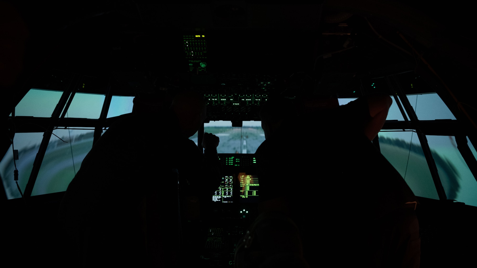 Civic leaders from the Tampa Bay metropolitan area tour a 492d Special Operations Wing AC-130J Ghostrider simulator during a tour of Hurlburt Field, Florida, May 21, 2025. The two-day-long tour brought 15 civic leaders to Hurlburt Field and Joint Base Charleston, South Carolina, to better understand the role of inter-wing interoperability in accomplishing Department of Defense initiatives. (U.S. Air Force photo by Senior Airman Zachary Foster)
