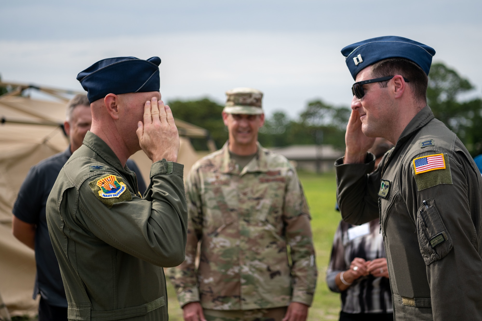 U.S. Air Force Col. Edward Szczepanik, 6th Air Refueling Wing commander, recognizes a member of the 1st Special Operations Wing during a tour of Hurlburt Field, Florida, May 21, 2025. The tour provided 6th ARW personnel the opportunity to hone their warrior ethos, bringing a renewed dedication to readiness and lethality back to the installation. (U.S. Air Force photo by Senior Airman Zachary Foster)