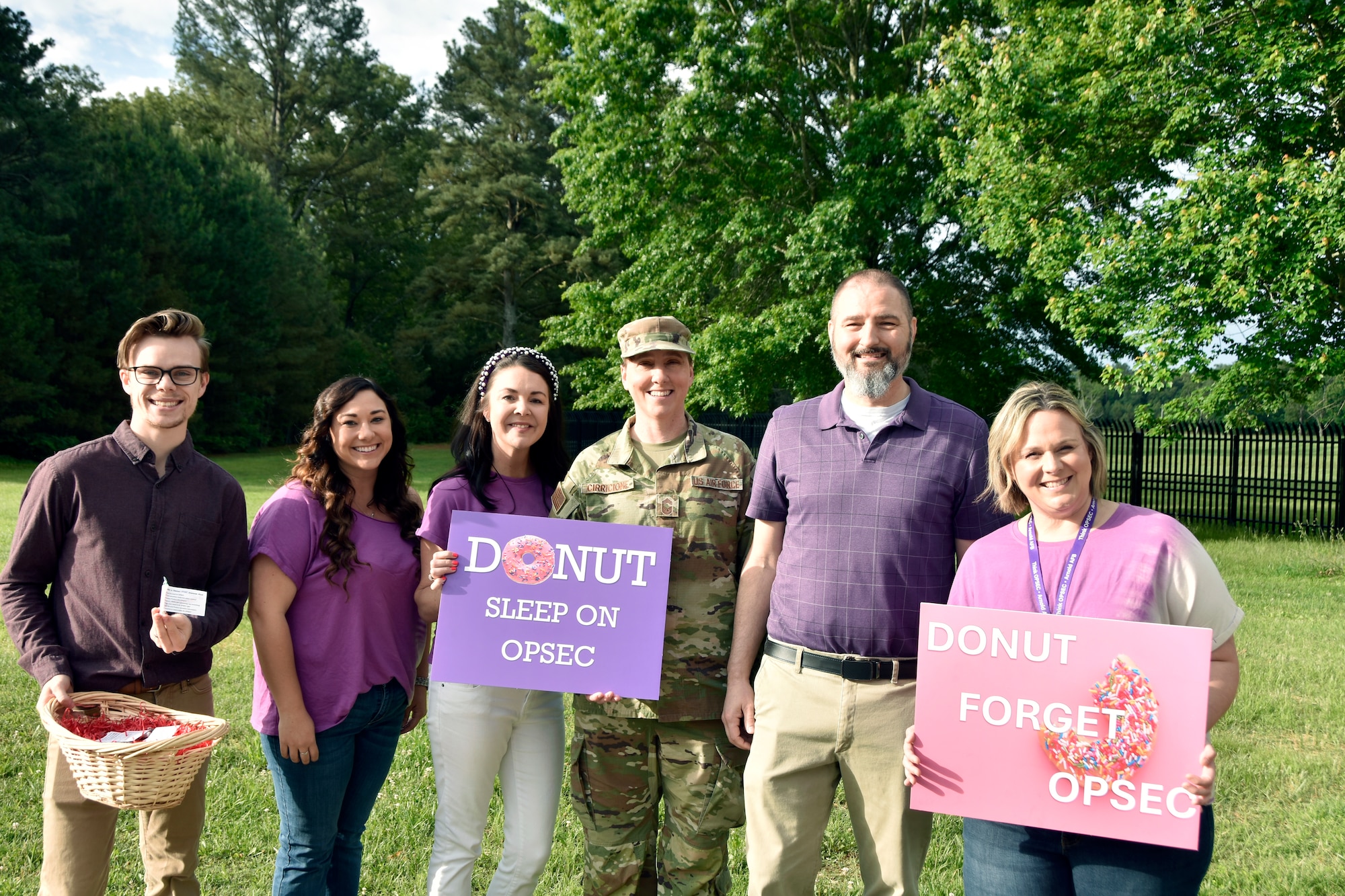 The Arnold Engineering Development Complex Information Protection Team poses for a photo with AEDC Senior Enlisted Leader Chief Master Sgt. Jennifer Cirricione, third from right, following May 22, 2025, hosted by the IP team to coincide with National OPSEC Awareness Month. The AEDC IP team held events throughout May to promote the importance of operations security, more commonly referred to as OPSEC, among the AEDC workforce. Arnold AFB is the headquarters of AEDC. Also pictured, from left, are Security Manager Caleb Gott, Security Manager Tori Duvall, AEDC OPSEC Program Manager Holly Jones, AEDC IP Chief Jared Allen and AEDC IP Deputy Chief Sara Liner. (U.S. Air Force photo by Bradley Hicks)