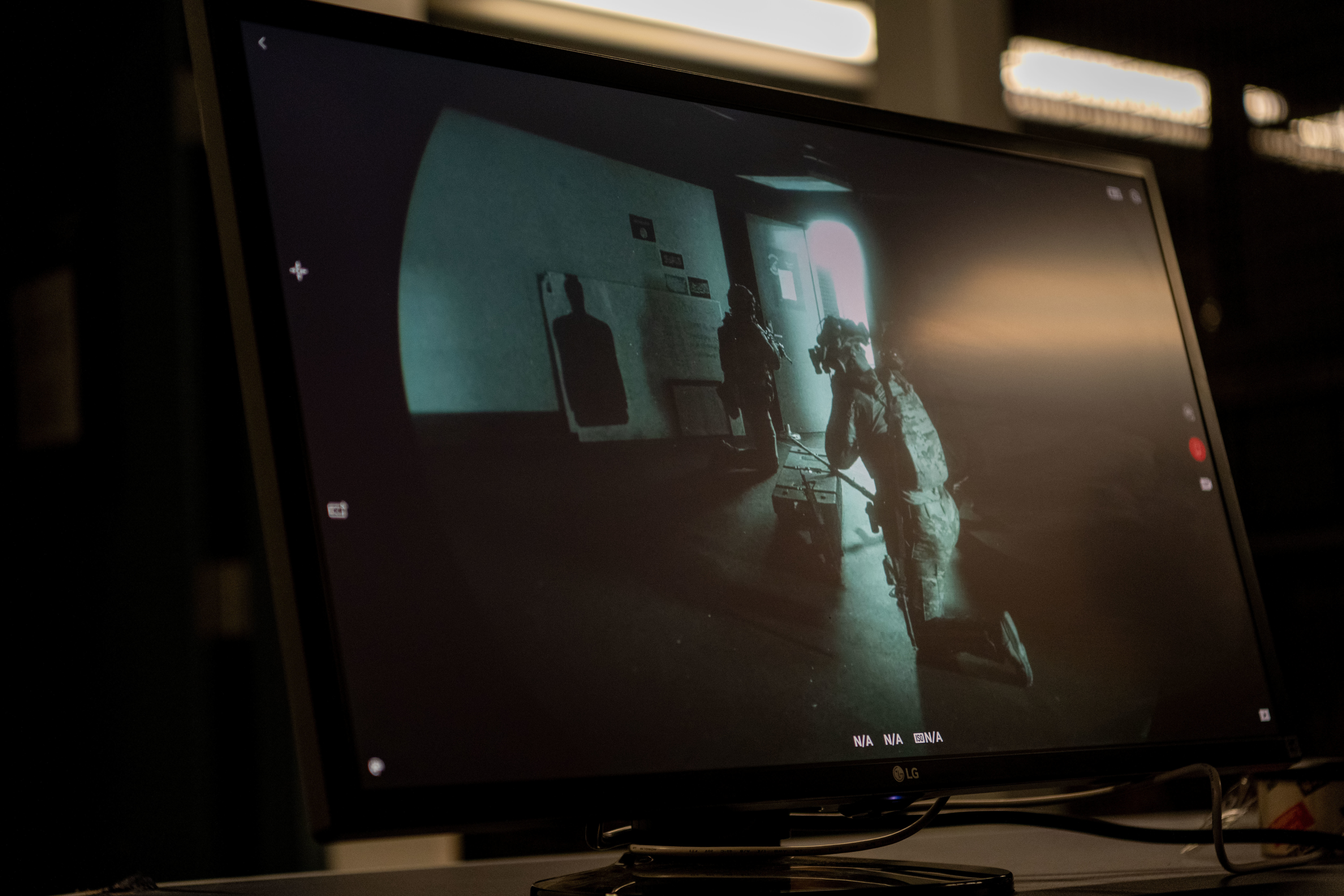 Combat camera (COMCAM) members assigned to the 1st Combat Camera Squadron, showcase room clearing capabilities for civic leaders from the Tampa Bay metropolitan area during a tour of Joint Base Charleston, South Carolina, May 22, 2025. COMCAM personnel showcased their multi-capable mindset with a room clearing and intelligence gathering demonstration. (U.S. Air Force photo by Senior Airman Zachary Foster)