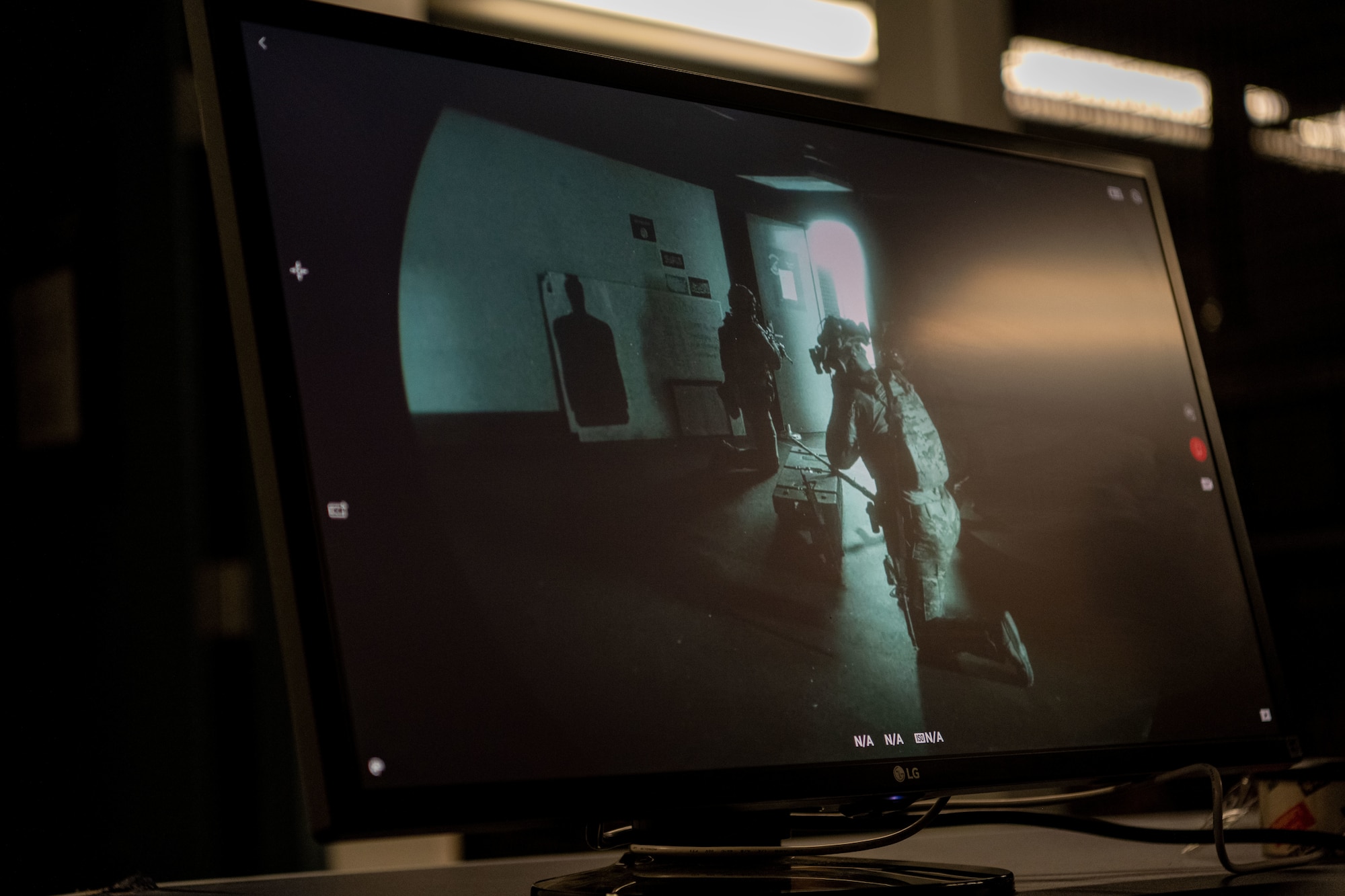 Combat camera (COMCAM) members assigned to the 1st Combat Camera Squadron, showcase room clearing capabilities for civic leaders from the Tampa Bay metropolitan area during a tour of Joint Base Charleston, South Carolina, May 22, 2025. COMCAM personnel showcased their multi-capable mindset with a room clearing and intelligence gathering demonstration. (U.S. Air Force photo by Senior Airman Zachary Foster)