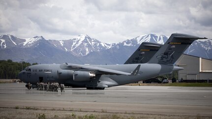 Junior Reserve Officer Training Corps cadets from Dimond, Bartlett, Service, East, Colony and the Bethel Regional high schools visit with members of the Alaska Air National Guard’s 176th Wing at Joint Base Elmendorf-Richardson, Alaska, May 28, 2025. The cadets’ visit was part of the Junior ROTC Cadet Leadership Challenge camp, designed to develop leadership skills, teamwork, and military discipline. During their tour the cadets interacted with 176th Wing Guardsmen and participated in familiarization flights aboard a C-17 Globemaster III and a HH-60G Pave Hawk helicopter.
