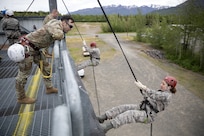 Junior Reserve Officer Training Corps cadets from Dimond, Bartlett, Service, East, Colony and the Bethel Regional high schools conduct rappel training at Joint Base Elmendorf-Richardson, Alaska, May 29, 2025. The rappel training was part of the Junior ROTC Cadet Leadership Challenge camp, designed to develop leadership skills, teamwork, and military discipline among the cadets. Alaska Army National Guard Recruiting and Retention Battalion personnel served as safety observers and mentors, providing guidance, ensuring safety, and sharing their expertise to enhance the cadets’ training experience.