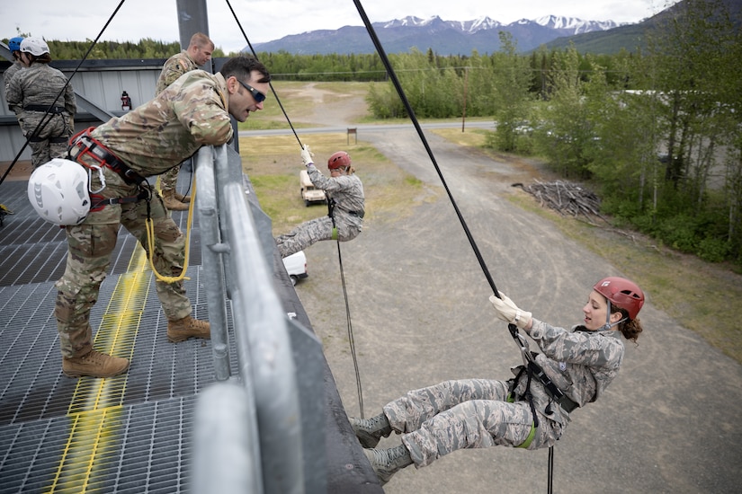 Junior Reserve Officer Training Corps cadets from Dimond, Bartlett, Service, East, Colony and the Bethel Regional high schools conduct rappel training at Joint Base Elmendorf-Richardson, Alaska, May 29, 2025. The rappel training was part of the Junior ROTC Cadet Leadership Challenge camp, designed to develop leadership skills, teamwork, and military discipline among the cadets. Alaska Army National Guard Recruiting and Retention Battalion personnel served as safety observers and mentors, providing guidance, ensuring safety, and sharing their expertise to enhance the cadets’ training experience.