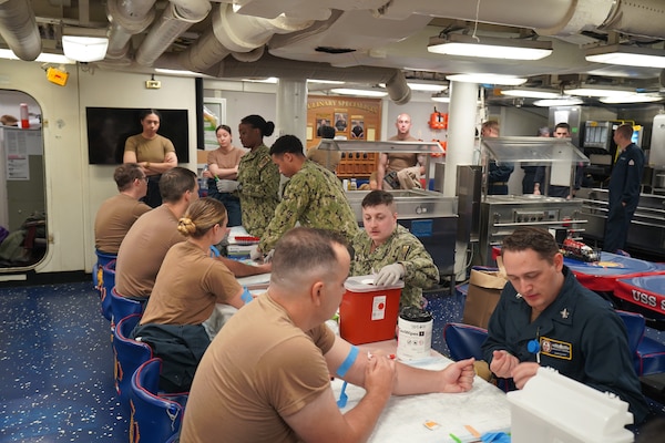 250521-N-FT324-1769. ROTA, SPAIN (May 21, 2025). Staff from Naval Medical Readiness Training Command (NMRTC), Rota perform laboratory draws aboard the USS Stout (DDG 55), in support of Individual Medical Readiness (IMR) requirements. These efforts ensure Sailors are medically prepared for deployment while also allowing NMRTC personnel to maintain clinical proficiency in operational environments. (U.S. Navy Photo by Lt. Cmdr. Alicia Sacks)
