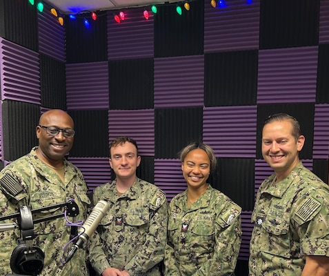 250604-N-TY711-3206 SIGONELLA, Italy. (June 4, 2025) Captain TaRail A. Vernon, Commanding Officer of U.S. Naval Hospital Sigonella, hosts a Patient Informational Minute segment at AFN Sigonella, joined by Cmdr. Radhames Lizardo, Director for Surgical Services and General Surgeon, to discuss the importance of colorectal cancer screenings. Mass Communication Specialist Second Class Eloise Johnson (DJ EJ) and Mass Communication Specialist Second Class Richard Anglin (DJ Salamander) facilitated the recording on June 4 in Sigonella, Italy. (U.S. Navy photo by Lieutenant Commander Brandi Gibson)